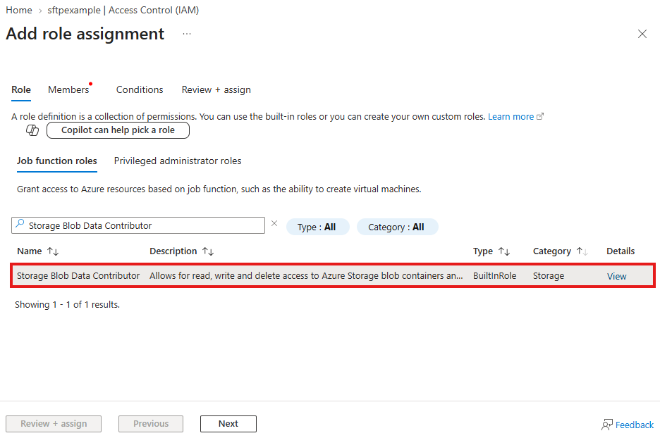 "'Add role assignment' page on the 'Job function roles' tab with 'Storage Blob Data Contributor' highlighted."